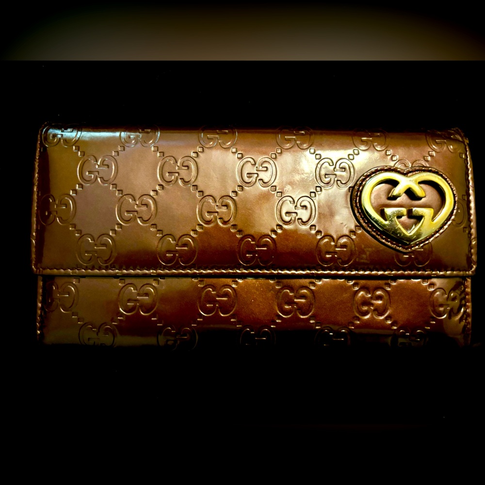 Gucci Guccisima intertwined heart wallet